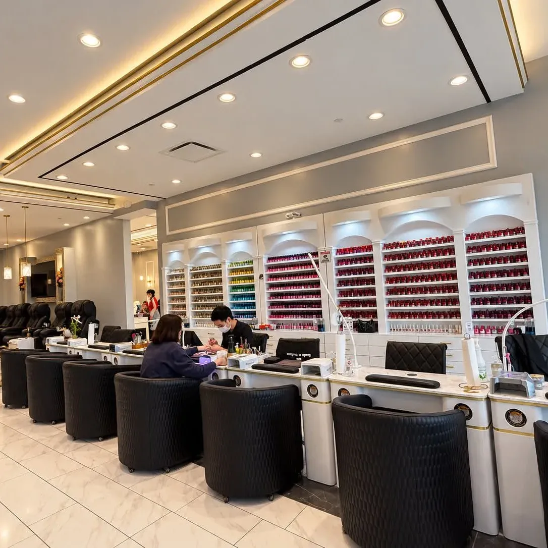 Xu Nails & Lashes technicians working at the manicure stations